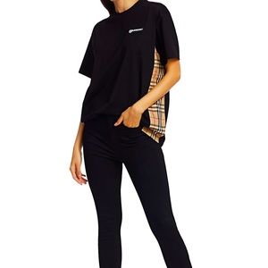 T shirt with small dart/seam repaired at bottom